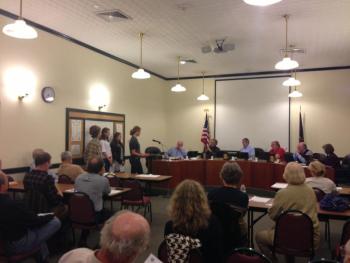 Camden Hills Regional High School students Kate Sensenig, Aidan Acosta, Max Horovitz, Kiera Haining and Abby Blakeley request support from the Camden Select Board Oct. 15 to allow for the future installation of a micro-hydro power project on the dam at the mouth of the Megunticook River.