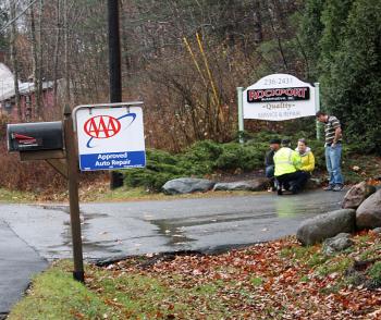 Sharon Hobson of Rockland, flanked by bystanders, talks to a North East Mobile Heatlh EMS provider after a South Thomaston woman rear-ended her car on Route 1 in Rockport Monday morning.
