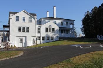 A new parking lot and access road from Waldo Avenue were added as part of the conversion of the single-family dwelling to a business. (Photo by Wes Sterrs)