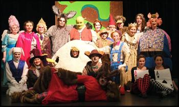 A partial cast of Shrek the Musical.