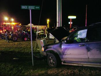 This Ford Explorer crashed into a utility pole after reportedly being hit by a car that ran a stop sign at the intersection of Routes 137 and 220 in Knox. (Photo by Ethan Andrews)