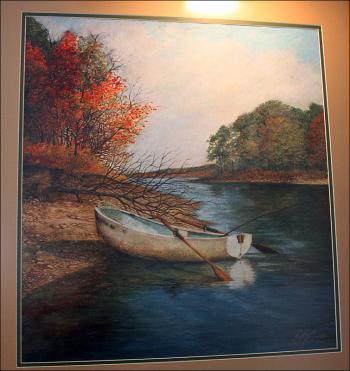 ‘I started painting in 1989 after I decided I wanted something for my wall,’ said Ben McGinnis. This is his first watercolor, and the little boat still sits in his yard, today covered in snow and a layer of ice. (Photo by Holly S. Edwards)
