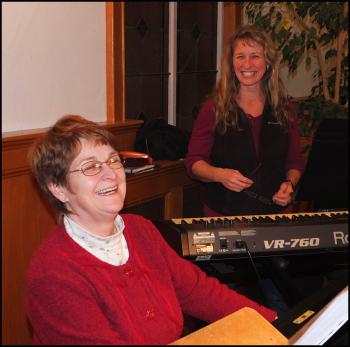 On keyboards are Sybil Wentworth of Union (front) and Tracey Payor of South Thomaston.