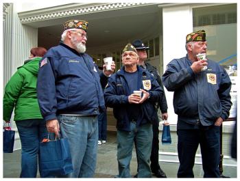 Members of the Belfast-based VFW Post 3108 were among scores of veterans on hand to greet the wreath-bearing trucks, Sunday. (Photo by Ethan Andrews)