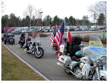 Outside Bank of America in Belfast, motorcycles, tractor trailers and scores of other vehicles traveling with Wreaths Across America. (Photo by Ethan Andrews)