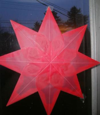 Paper ornaments with twilight shining through. (Photo by Kay Stephens)