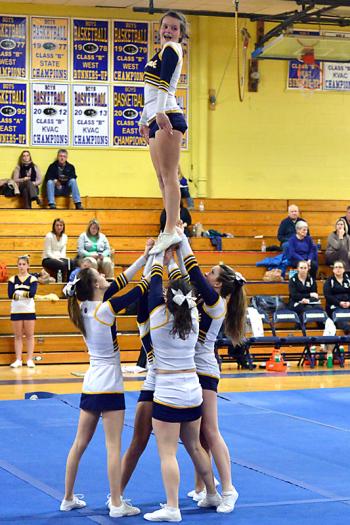Medomak’s Stephanie Hill, top, appears to feel pretty confident with her teammates below. (Photo by Ron Hawkes)