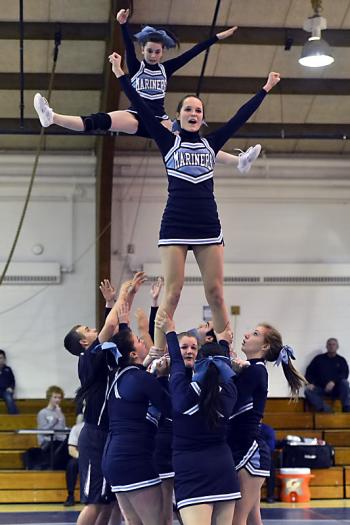 Oceanside’s Charlotte Strong-Ames, front and high flyer Kaydin Fredrick, back, brought a few gasps from the audience as to how high Fredrick went up. (Photo by Ron Hawkes)