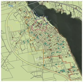 A wide view of downtown Belfast. Properties that would become eligible for subdivision if smaller lot sizes are approved appear in aqua. Unaffected lots would include those smaller than 7,500 square feet (white), from 15,000 to 20,000 square feet (brown), and larger than 20,000 square feet (light green). The largest could be subdivided under current zoning rules. (Source: Belfast Planning Office)