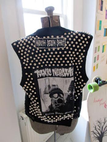 The studded jacket he designed on display at the Center for Contemporary Maine Art. (Photo by Kay Stephens)