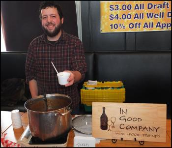In Good Company's Josh Anderson serves up all natural ground sirloin chili. (Photo by Chris Wolf)