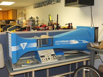 A small but mighty wind tunnel waits its turn in the engineering lab.