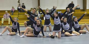 The Oceanside cheering squad performed at the wrestling meet Wednesday at Oceanside West. This was the first public performance of the year for the Mariners. (Photo by Ron Hawkes)