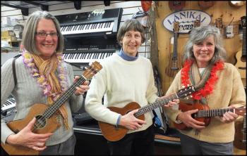 Left to right: Pam Farrar, of Ellsworth, Gloria Howard, of Bangor, and Linda Bohm, of Ellsworth, enjoy the fun at K2 Music.