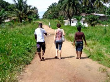 From left: Teloe, Kim, and LEF student Felicia in Buchanan, Liberia.