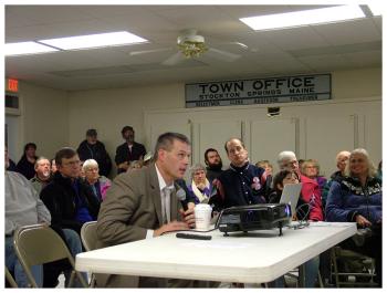 Searsport District Middle and High School Principal Brian Campbell, center, talks to a crowd in Stockton Springs, Feb. 27, about an ambitious four-year plan for Searsport’s secondary schools. (Photo by Ethan Andrews)