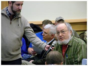 Environmental advocate Ron Huber of Searsport questions the conclusion of federal officials that the sediment to be dredged from Searsport Harbor is essentially clean. “We’ve heard that before,” he said. (Photo by Ethan Andrews)