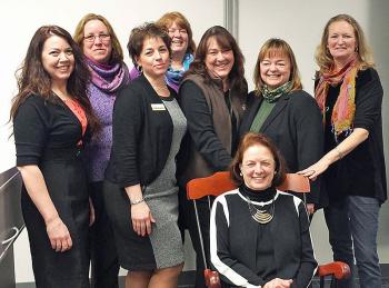 Nancy Boyington, seated, with MidCoast Leadership Academy graduates Erica Hughes, Kathy Hayes, Andrea Walker, Lori Roming, Terri Mahoney, Kim Scott and Robin McIntosh.