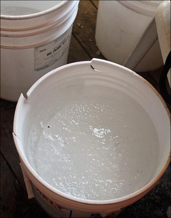 Every bit of Tom Cox’s maple sap is currently frozen solid, which means he can still use it, but he has to wait for it to thaw back to a liquid. (Photo by Holly S. Edwards)