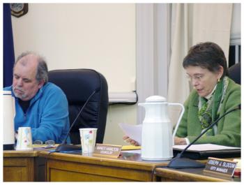 City Councilors Mike Hurley and Nancy Hamilton each spoke against the idea of divestment. Hurley later agreed to a tempered support for a citizen initiative seeking to rid the state’s employee retirement fund of fossil fuel company investments. (Photo by Ethan Andrews)