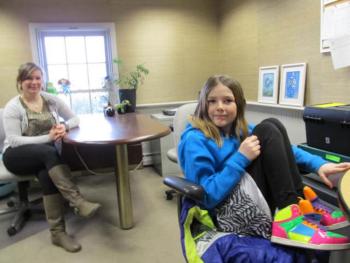 Jessica Fossett in her Camden office at BBBS with her “Little” Kylee, 10. Photo by Kay Stephens