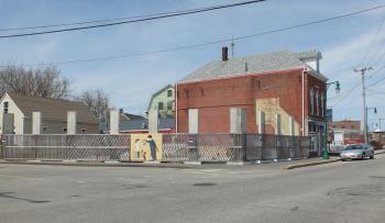The proposed hotel at 250 Main Street as it has sat since foundation work on the proposed hotel was halted. (Photo by Chris Wolf)