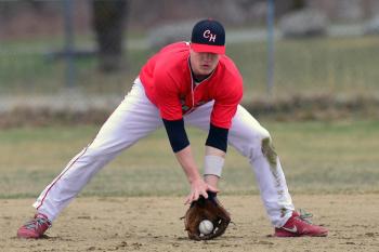 Camden Hills Chandler Crans makes the play on a hard hit grounder. (Photo by Ron Hawkes)