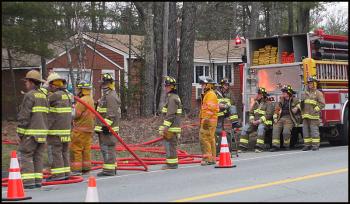 Rockport firefighters at the scene of the final training fire Sunday morning on Route 90. (Photo by Chris Wolf)