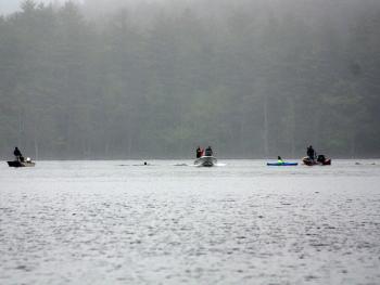 First responders and good Samaritans search Megunticook Lake in Camden Tuesday morning for a missing sculling boat rower. (Photo by Holly S. Edwards)