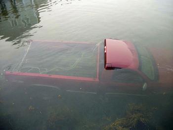 Justin Libby’s truck under the water in Port Clyde harbor Thursday morning. (Courtesy Knox County Sheriff’s Office)