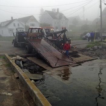Automaster Collision Center of Spruce Head was called to pull Justin Libby’s pickup truck out of the harbor, off the boat launch, in Port Clyde. (Courtesy Chris Chadwick)