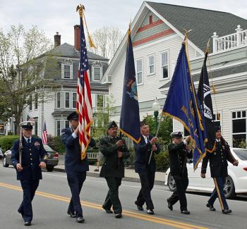 The color guard leads the parade into downtown Camden Monday morning. (Photo by Holly S. Edwards)