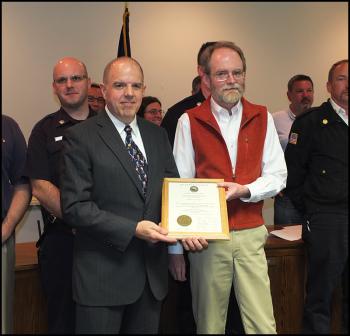 Retired Chief Charles Jordan Jr, with Mayor Larry Pritchett.