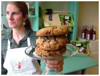 Amada Carnes with a stack of “field cookies” at the newly-opened North Woods Gourmet Girl store in Belfast. (Photo by Ethan Andrews)