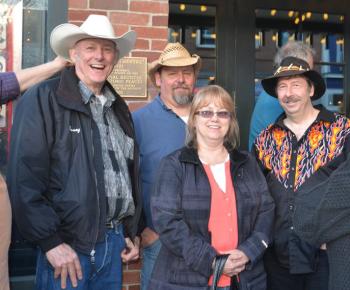 Rosey Gerry and friends line up outside the Strand Theatre to hear country music star guitarist and singer Junior Brown. It was a sold-out show. (Photo by Lynda Clancy)