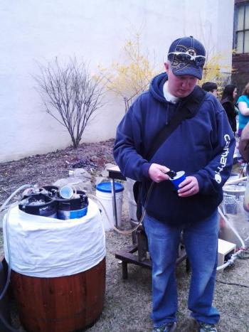 About a half dozen homebrewers were on hand to teach the public how it’s done, and of course, sample the end product. Photo by Kay Stephens
