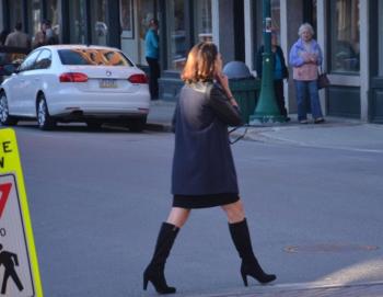 Suzette McAvoy, director of CMCA, walks in art. (Photo by Lynda Clancy)