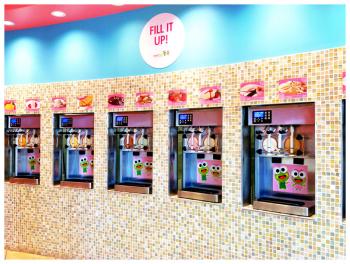 Frozen yogurt dispensers at a Sweet Frog shop in Connecticut. A branch of the national chain is under construction in Reny’s Plaza. (Photo by Ethan Andrews)