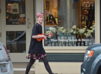 Art Walk was not limited to hangings on the walls; there was music, and ukeleles. (Photo by Lynda Clancy)
