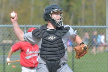 Lincoln Academy catcher Wally Morris makes a throw to second base. (Photo by Ron Hawkes)
