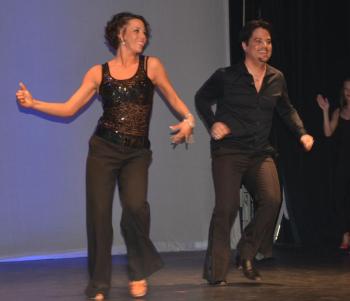 Local Star Rafi Baeza and Jessica Libby perform the Salsa. (Photo by Lynda Clancy)