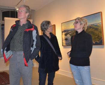 Mike, Lisa and Katie are taken in all directions by the art. (Photo by Lynda Clancy)