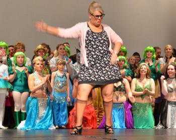 Staci Coomer, director, Penobscot Bay Regional Chamber of Commerce, pours it on to “Boom! Shake the Room!” (Photo by Lynda Clancy)