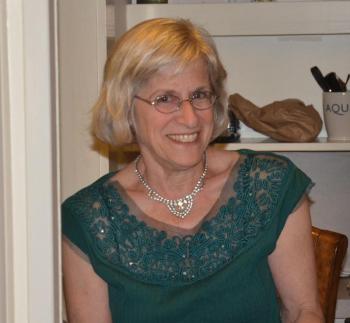 Wayfinder Schools consultant and long-time staffmember Andrea Itkin, of Camden, sells tickets to the show. (Photo by Lynda Clancy)