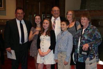 Eric Walker with (from left to right): daughters Alison,15, and Kristina, 13, Governor LePage, son Tommy, 11, wife Susan and Walker’s mother, Catherine Walker. (Photo by Erica Thoms)