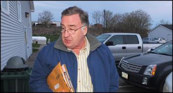 Chuck Kruger, president of the Rockland Festival Corporation, was outside City Hall following Monday night's vote by the Rockland City Council not to waive fees for the Lobster Festival this year. He expressed dismay and disappointment. (Photo by Chris Wolf)