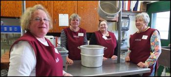 Members of the Mussel Ridge Historical Society, from left, Susan Thomas, Carol Philbrook, Linda Bray-Christie and Kay Dodge, attend to kitchen duties for Sunday’s ice cream social at Owls Head Central School. (Photo by Chris Wolf)