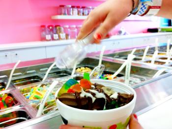 Among the new stores that have opened in Belfast recently, there are a number of businesses at various stages of construction, including a branch of Sweet Frog, a national frozen yogurt chain. Pictured is the toppings bar at a Sweet Frog in Connecticut. (Photo by Ethan Andrews)