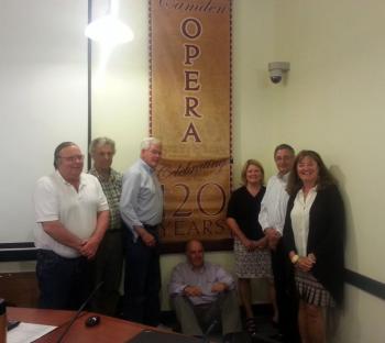 Right to Left: Kerry Hadley, Opera House Manager, Martin Cates, Chair, Camden Select Board, Amber Heffner, Bangor Savings Bank, and Select Board members - seated James Heard, Don White Vice Chair and OH Committee liaison, Leonard Lookner and James French. (photo by Ari Salas)
