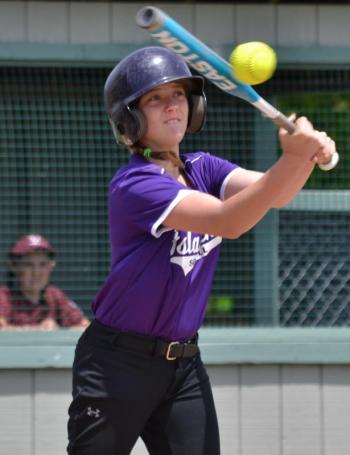 An Islanders player connects bat to ball. (Photo by George Harvey)